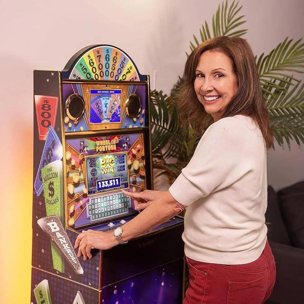 Arcade1Up Wheel of Fortune Casinocade Deluxe Home Arcade Machine, 63.4-Inch Tall - 4 Premium Casino Games, 20 Unlockable Built-In Titles, Dual LCD Screens & Speakers, WiFi-Enabled